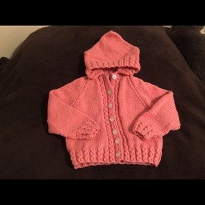 New hand knitted child’s sweater